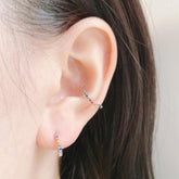 ห่วงเจาะรูปลูกบาศก์ด้านในสีรุ้ง (2 สี) 18G