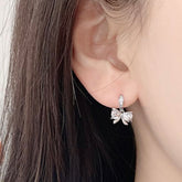 キラキラ リボン ピアス (2Color) 韓国 ガーリー フェミニン 揺れる 上品 リボンモチーフ ピアス