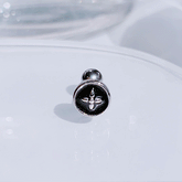 ブラック ラウンド サークル クロス ボタン ピアッシング Piercing from lizzy