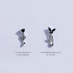 ブラックナイト 蝶々 ハート キュービック ショート ドロップ・ピアッシング Piercing from lizzy