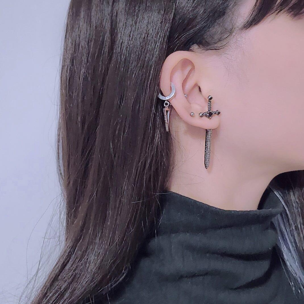 ユニーク クロス ソード ガム ピアッシング Piercing from lizzy