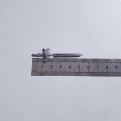 ユニーク クロス ソード ガム ピアッシング Piercing from lizzy