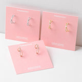 CUBIC CROSS LINE リング・ピアス Earrings pink-rocket 