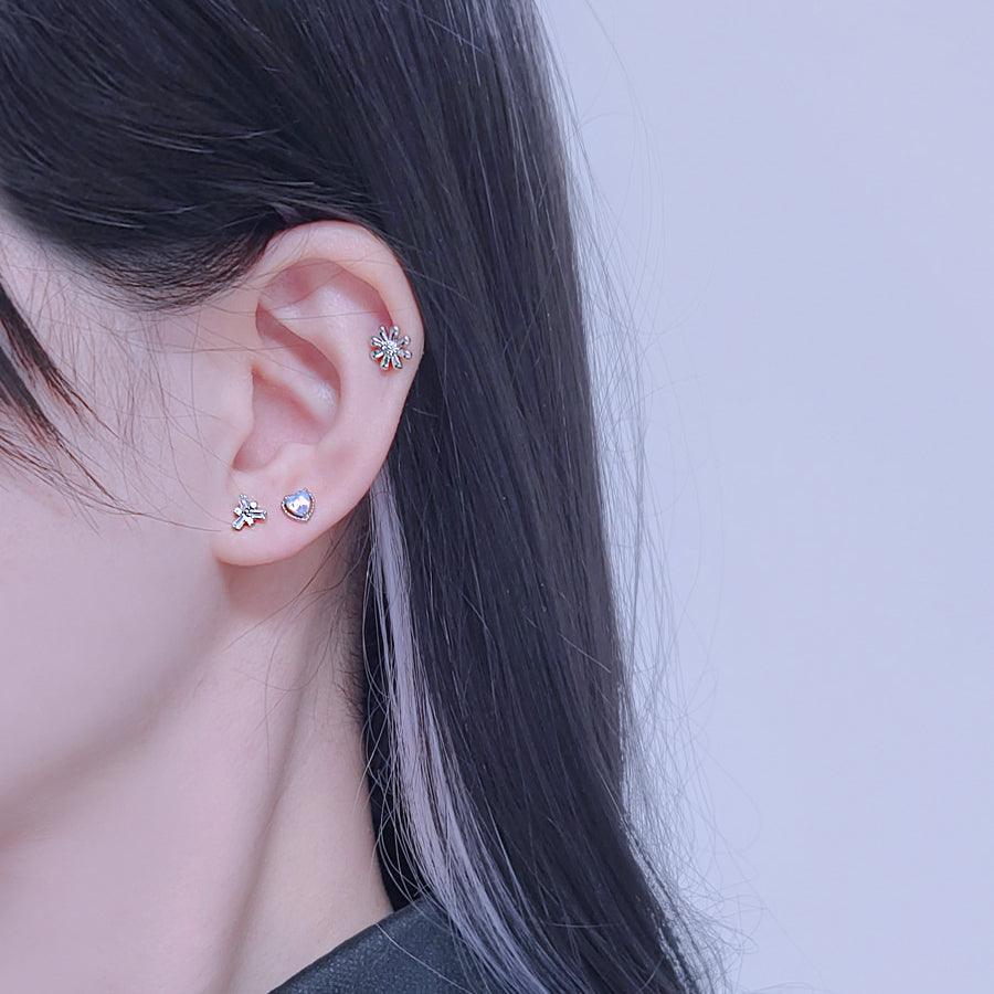 トゥインクルトライアングルキュービックピアッシング Piercing from lizzy 